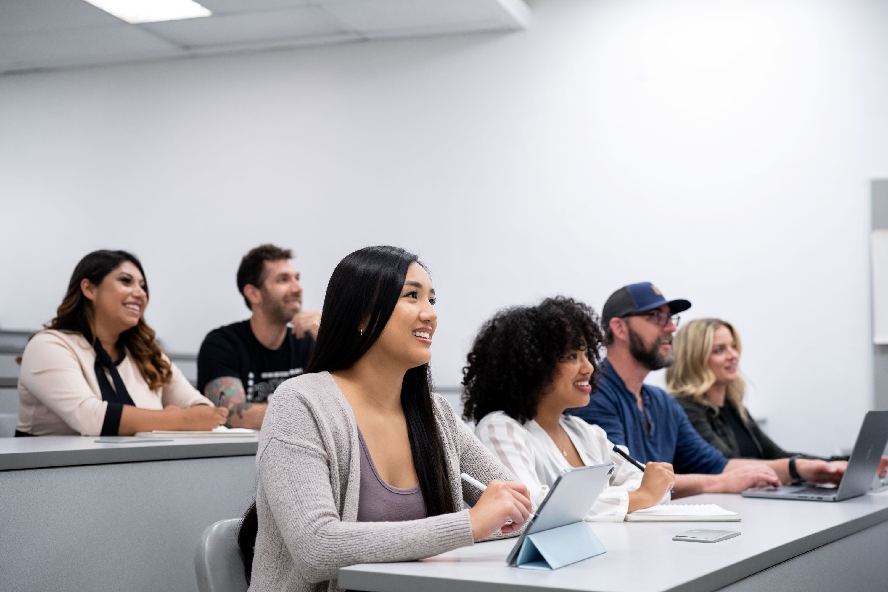 A group of students in a classroom lecture